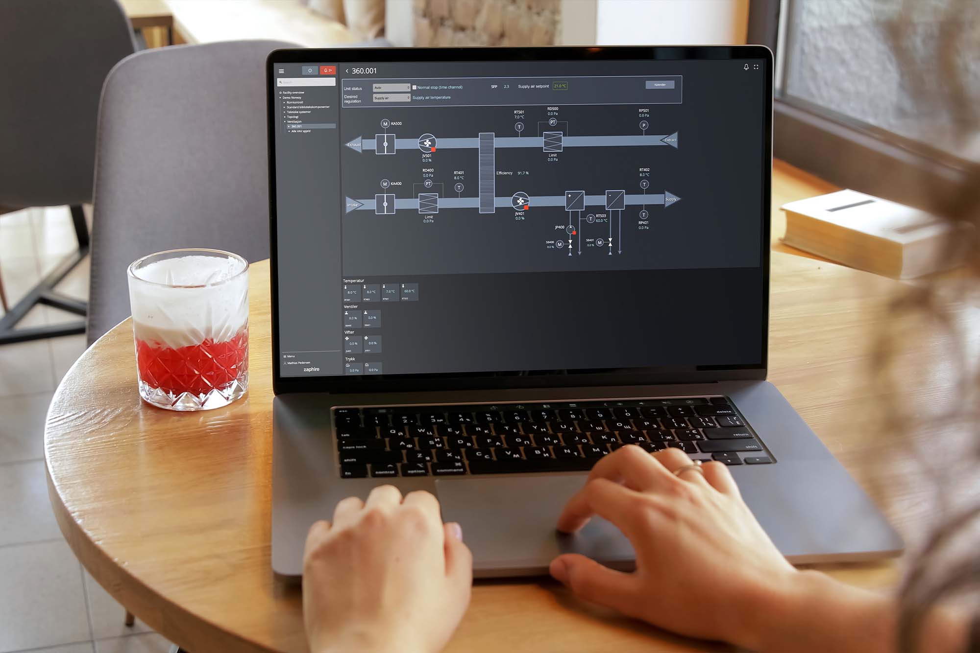 Person using Zaphire BMS for controlling the HVAC system